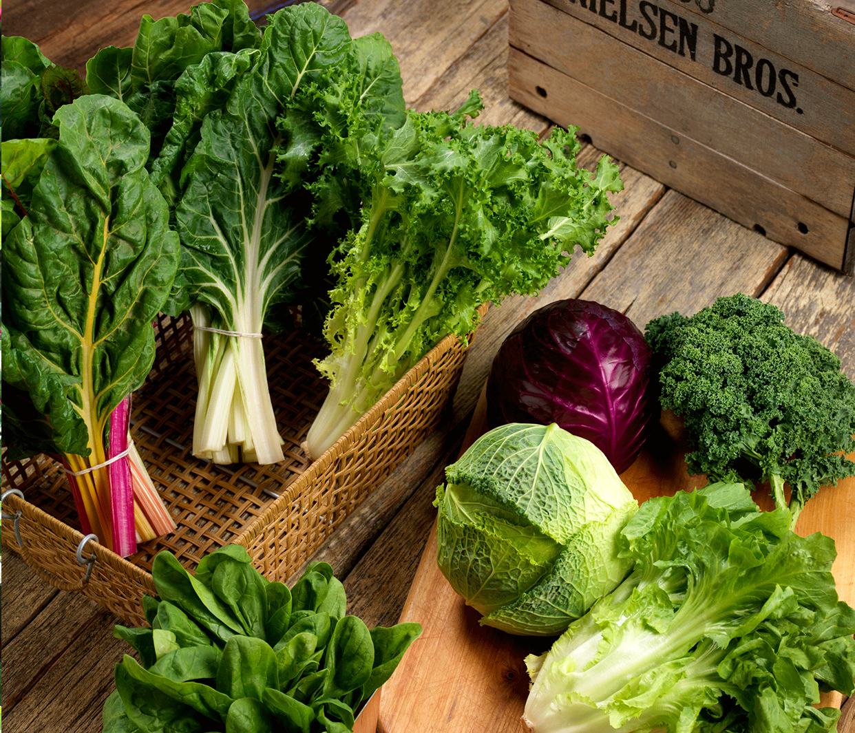 photo of assorted leafy greens on a kitchen counter